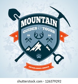 Mountain themed outdoors emblem logo with tools and axes