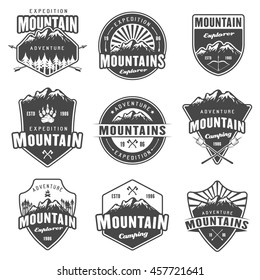 Mountain travel, outdoor adventure, camping and hiking set of black vector emblems, labels, badges and logos isolated on white background. Recreation and leisure design elements