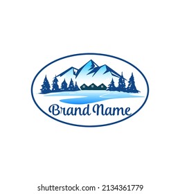 Mountain, Trees and Houses by the Lake Logo 