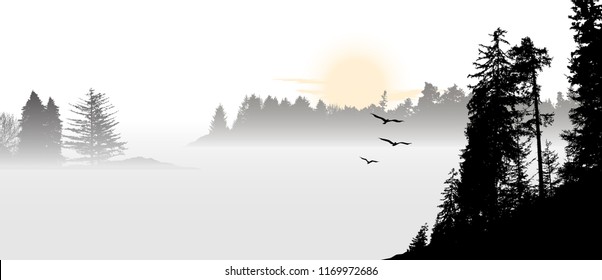 Mountain view with flying birds during sunrise