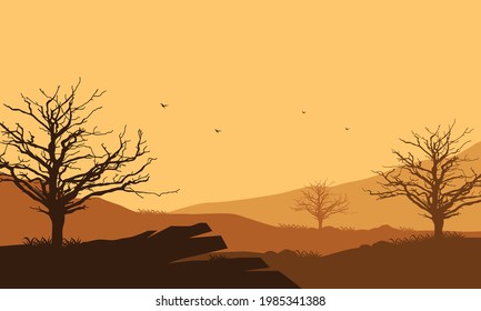 Mountain view with realistic dry tree silhouettes from the outskirts of the city in the evening. Vector illustration of a city