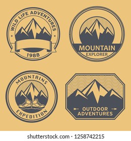 Mountain wild adventure signs or stamps set, vector illustration