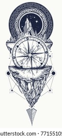 Mountains and antique compass tattoo and t-shirt design. Adventure, travel, outdoors, symbol