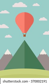 Mountains with big red balloon.flat colorful