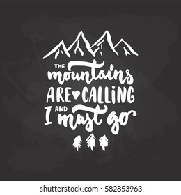 The mountains are calling and i must go - hand drawn travel lettering phrase isolated on the black chalkboard background. Fun brush ink inscription for photo overlays, print, poster design