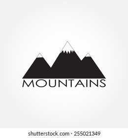 Mountains icon or label isolated on white background. Vector illustration.