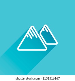 Mountains icon. Linear style with thin outline. Gray icon with long shadow in bottom left corner on blue background