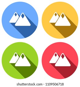 Mountains icon. Simple symbol. Set of white icons with long shadow on blue, orange, green and red colored circles. Sticker style