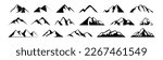 Mountains icons set. Black silhouettes of relief. Vector illustration in cartoon style isolated on white background