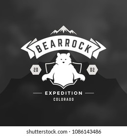 Mountains logo design vector illustration. Outdoor adventure expedition, bear silhouette shirt, print stamp. Vintage typography badge template.