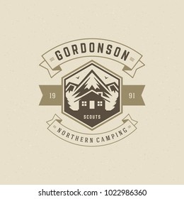 Mountains logo emblem vector illustration. Outdoor adventure camping, mountains and tent silhouettes shirt, print stamp. Vintage typography badge design.