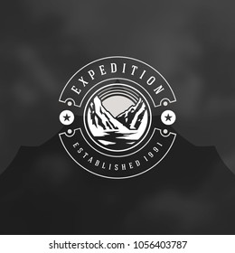Mountains logo emblem vector illustration. Outdoor adventure expedition, mountains silhouette shirt, print stamp. Vintage typography badge design.