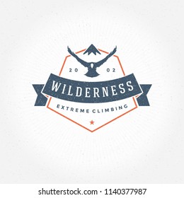 Mountains Logo Emblem Vector Illustration. Outdoor Adventure Expedition, Mountains And Flying Eagle Silhouettes Shirt, Print Stamp. Vintage Typography Badge Design.