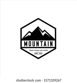 Mountains logo emblem vector illustration. Outdoor adventure expedition, mountains silhouette shirt, print stamp. Vintage typography badge design.