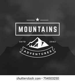 Mountains logo emblem vector illustration. Outdoor adventure expedition, mountains silhouette shirt, print stamp. Vintage typography badge design.