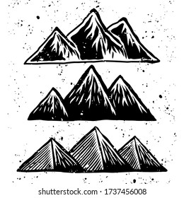 Mountains set of hand drawn rough vector graphic objects or design elements isolated on white background with textures on separate layers