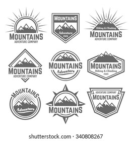 Mountains set of vector monochrome vintage badges, labels, emblems and logos isolated on white background