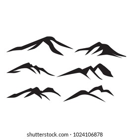 Mountains silhouettes on the white background. Vector set of outdoor design elements.