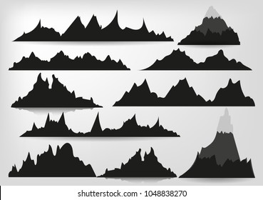 Mountains silhouettes on the white background.set of hand drawn landscape with silhouette mountain peaks.