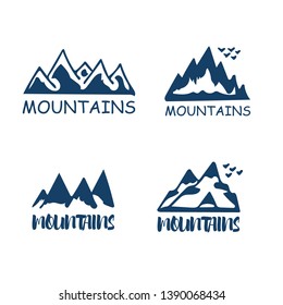 Mountains silhouettes on the white background. Vector set of outdoor design elements.