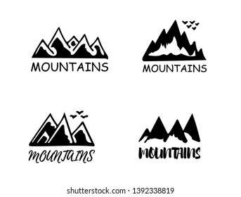 Mountains silhouettes on the white background. Vector set of outdoor design elements.