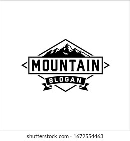 Mountains with vintage style badges