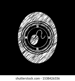 mouse icon inside chalkboard emblem written on a blackboard