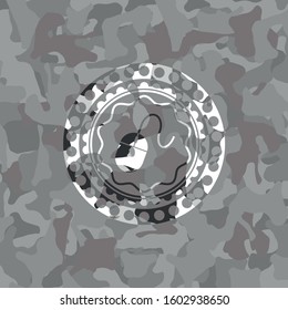 mouse icon on grey camouflage texture