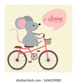 Ratón montando una bicicleta rosa
