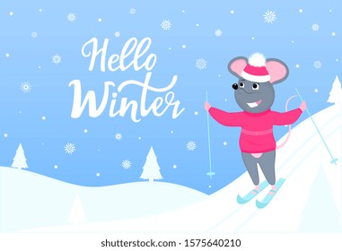 The mouse is skiing. Hello winter horizontal banner with winter landscape. Greeting card for New Year 2020 and Christmas