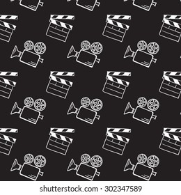 Movie camera and clapper board doodle vector seamless.