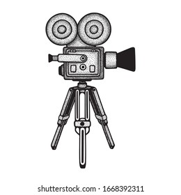 Movie camera. Engraving style vintage movie camera and tripod vector illustration. Part of set.  