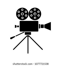 Movie camera glyph icon. Cine camera. Silhouette symbol. Negative space. Vector isolated illustration