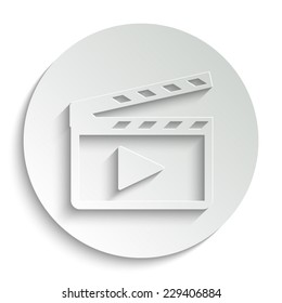 Movie clap - vector icon with shadow on a round button
