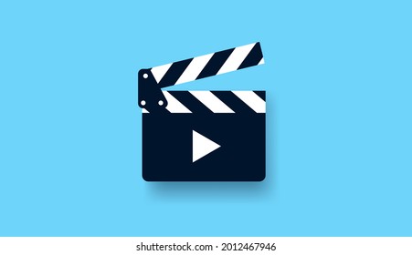 Movie clapper vector symbol - Video and film production icon on light blue background