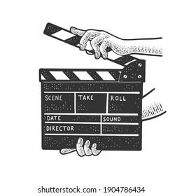 Movie clapperboard in hands sketch engraving vector illustration. T-shirt apparel print design. Scratch board style imitation. Hand drawn image.