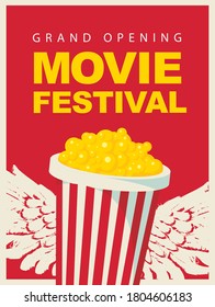 Movie festival poster, grand opening. Vector illustration with popcorn bucket, decorative wings and inscription on a red background. Suitable for flyer, invitation, ticket, web page