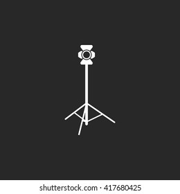 Movie floodlight on stand sign simple icon on  background