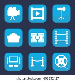 Movie icon. set of 9 filled movie icons such as camera, film tape, play, camera lense, studio lapm, camera focus, red carpet, TV set