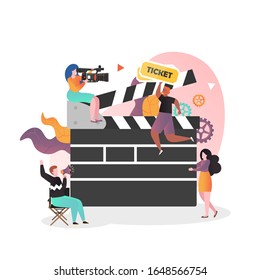 Movie production scene vector illustration. Huge clapperboard and micro characters shooting film. Cinematography, movie industry, filmmaking concept for web banner, website page etc.