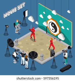 Movie set with actors director and cameramen decorations and equipment on blue background isometric vector illustration