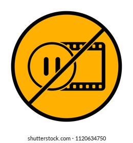 movie strip with pause symbol in circle. simple silhouette. not allowed, black object in warning sign with orange background color