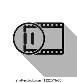 movie strip with pause symbol in circle. simple silhouette. Black object with long shadow on white background