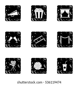 Movie theater icons set. Grunge illustration of 9 movie theater vector icons for web