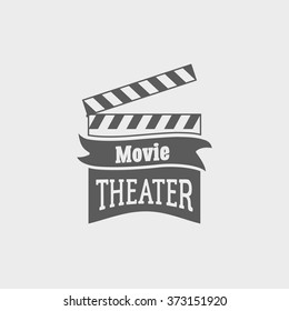 Movie theater vector logo with slate board for shooting movies