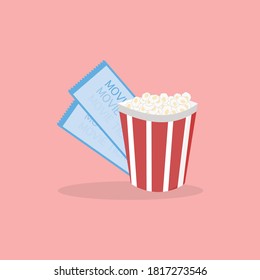 Movie tickets and popcorn on pink background 