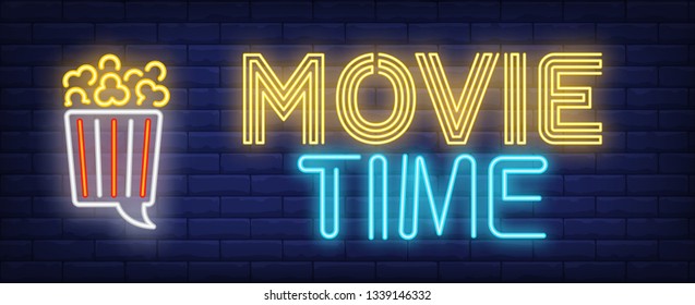 Movie time neon text with popcorn speech bubble. Cinema and entertainment concept, advertisement design. Night bright neon sign, colorful billboard, light banner. Vector illustration in neon style.