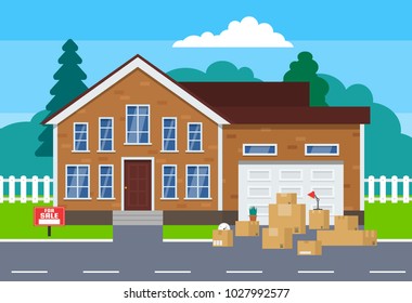 moving day concept.cardoard boxes near house for sale