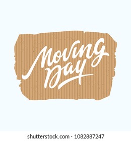 Moving Day lettering on a cartboard background. Vector design.