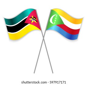 Mozambican and Comoran crossed flags. Mozambique combined with Comoros isolated on white. Language learning, international business or travel concept.